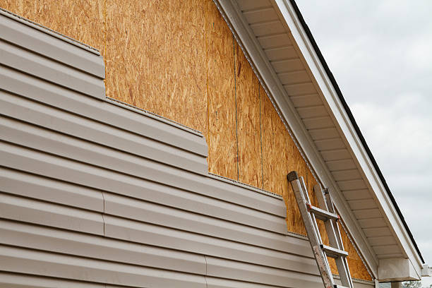 Professional Storm Damage Siding Repair technician working in Marion Center, PA
